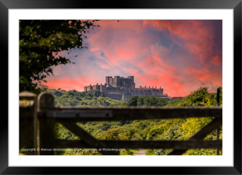 A moody Dover Castle over a wooden gate