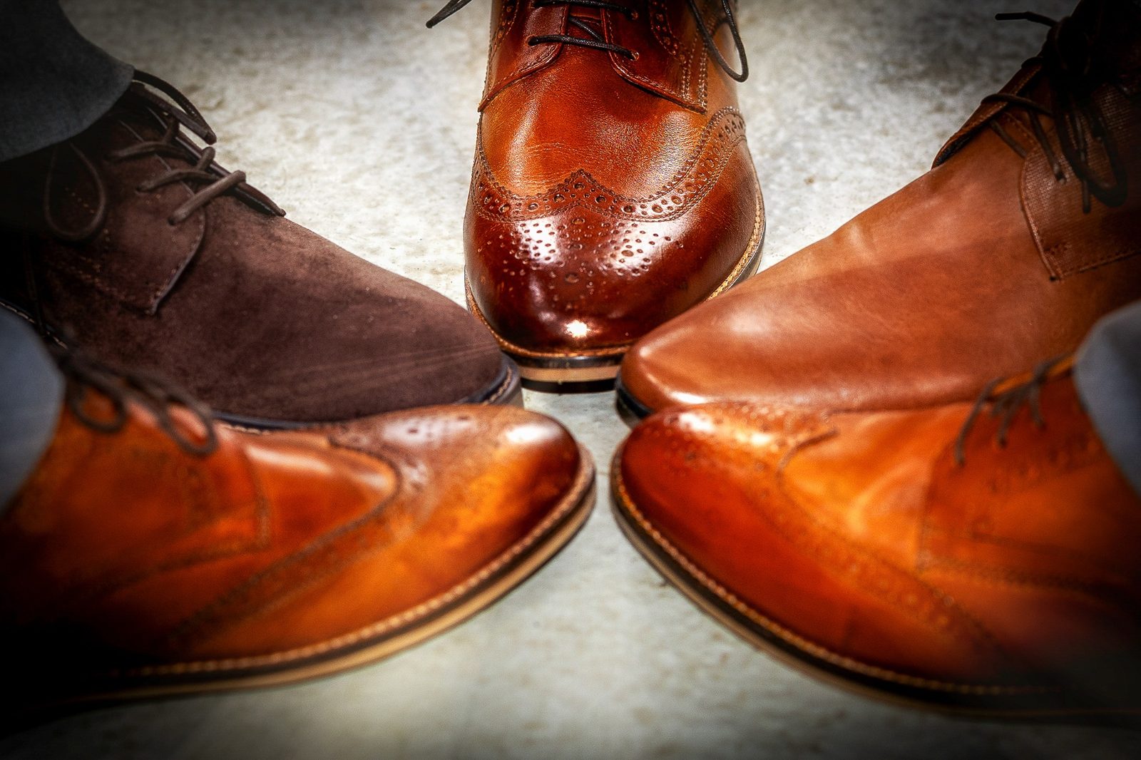 Groomsmen shoe detail photographed at Winters Barns wedding