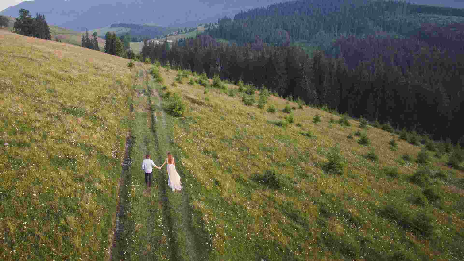 Bride and Groom walking drone photograph