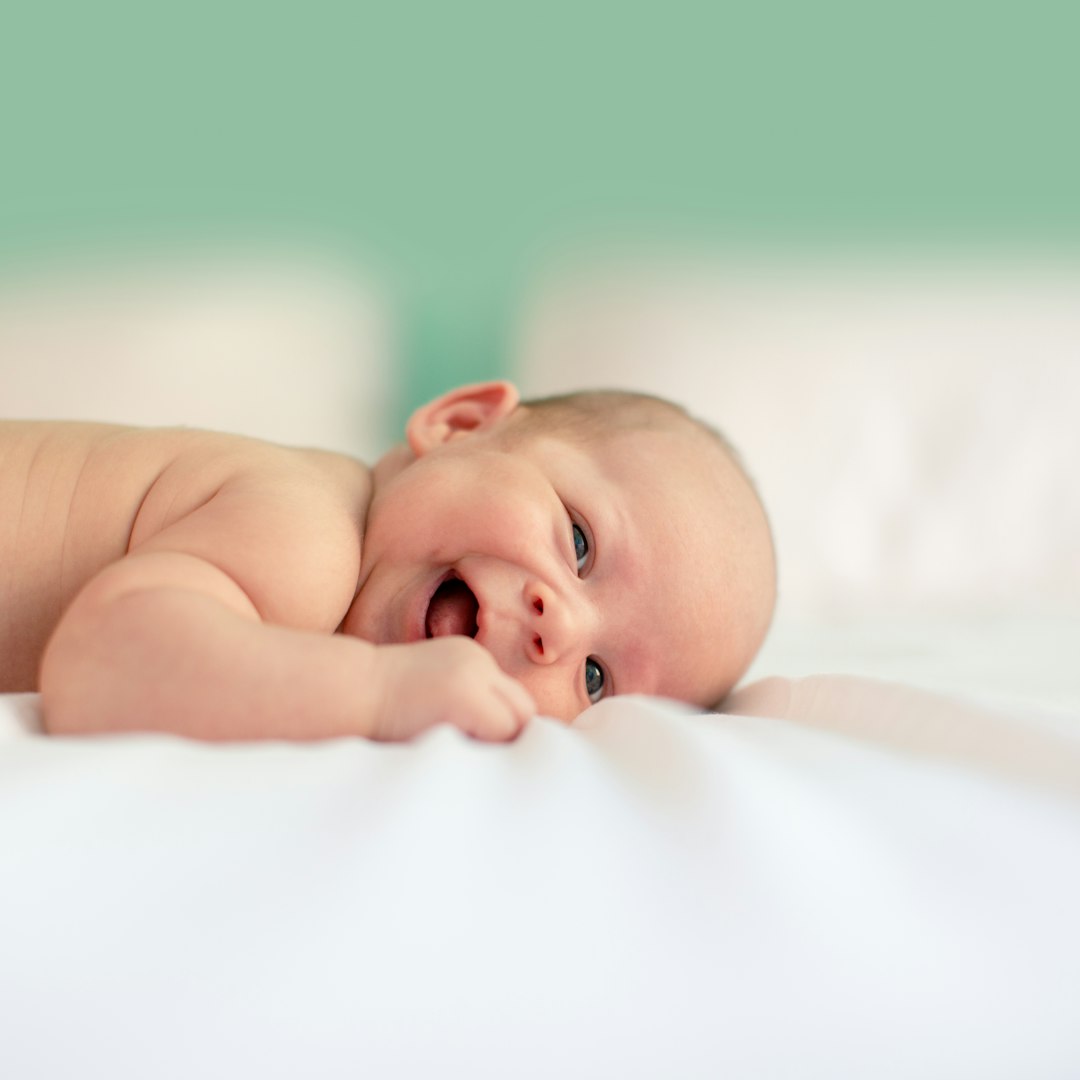 When should I book newborn photography?