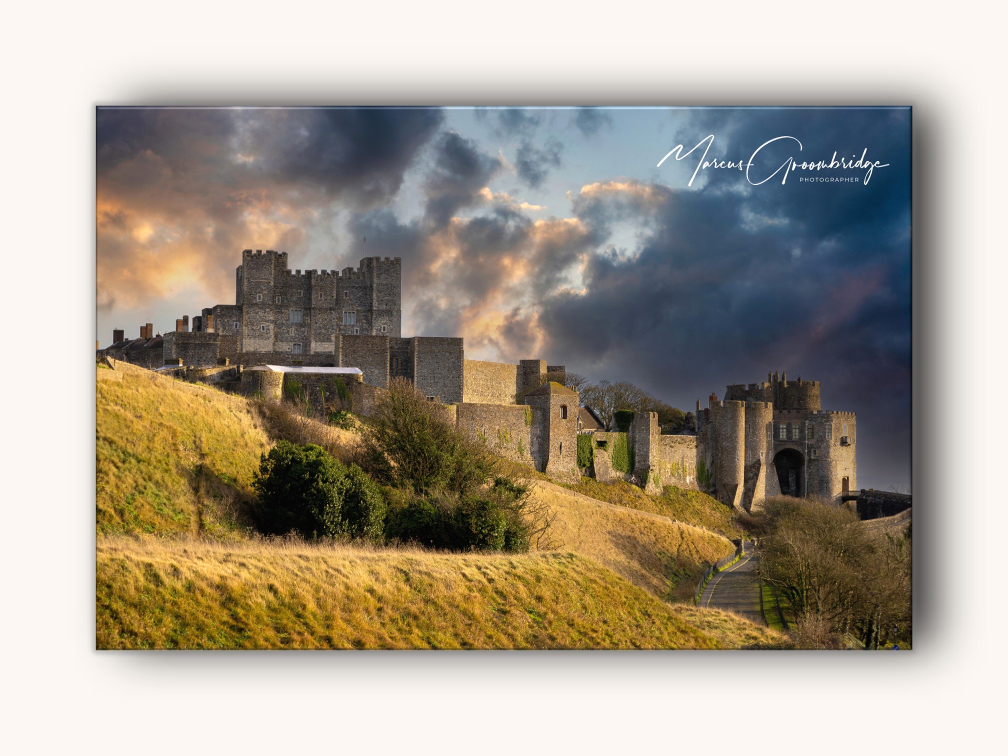 A photo of Dover Castle with a moody sky